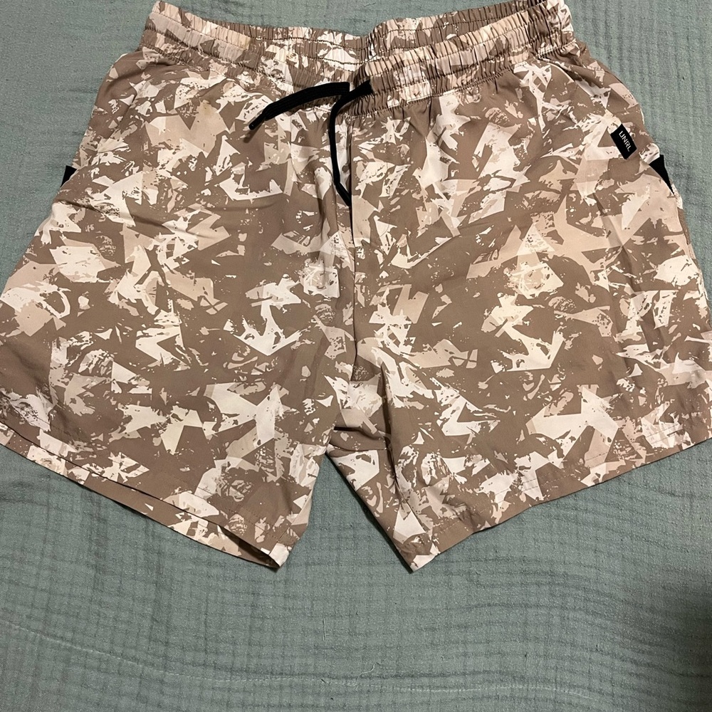 Beige and White Camouflage Shorts from unrl